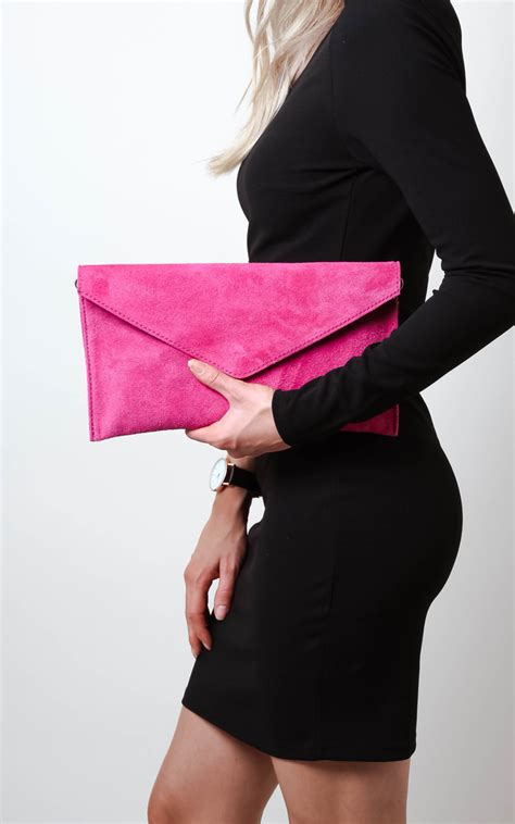 fuschia pink suede clutch bag